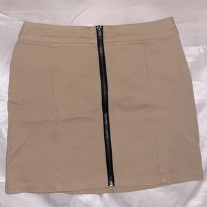 Nude front zip mini skirt
